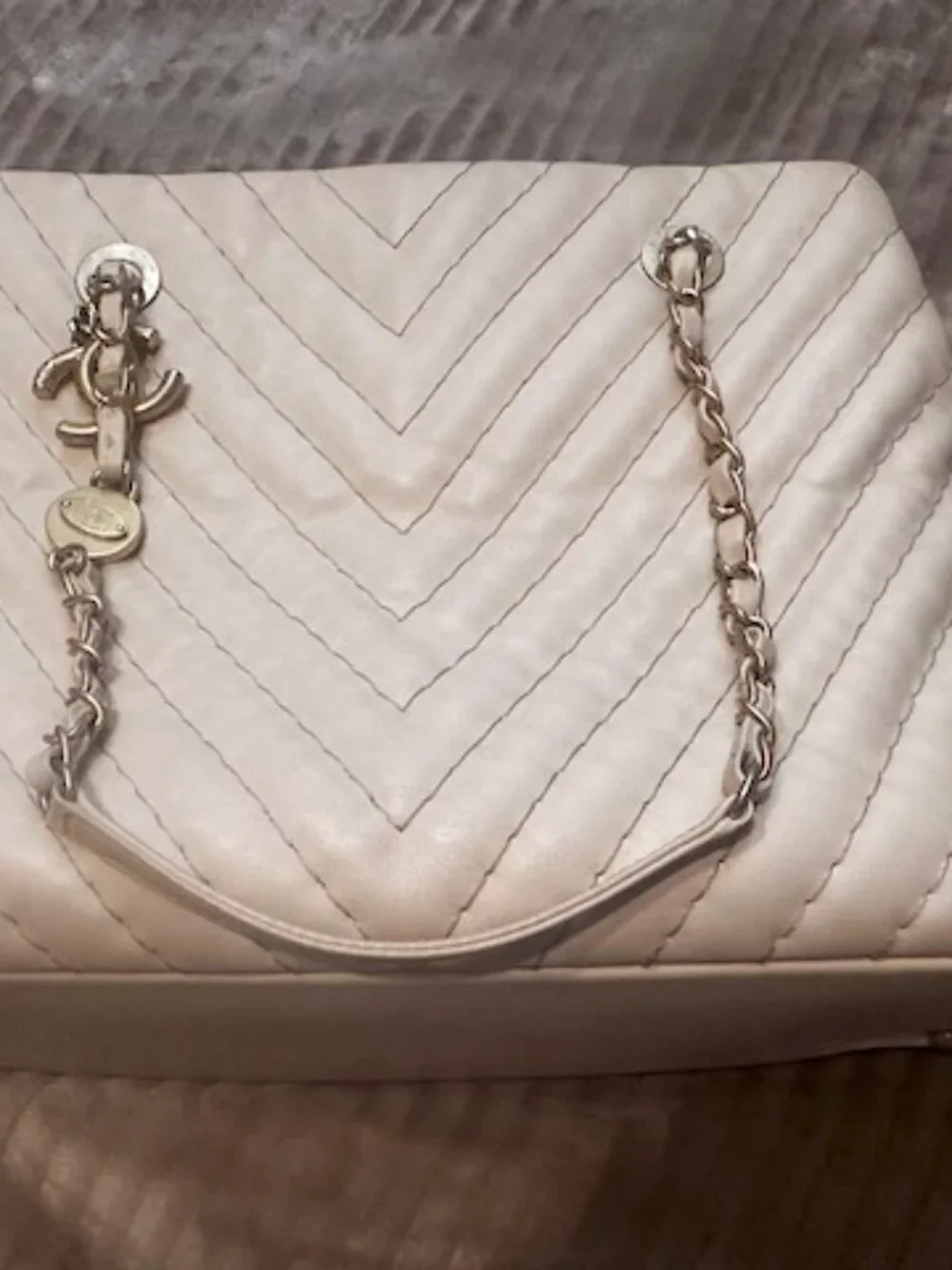 Chanel Surpique Chevron CC Charm Tote (often referred as Chevron V-Stitch Tote